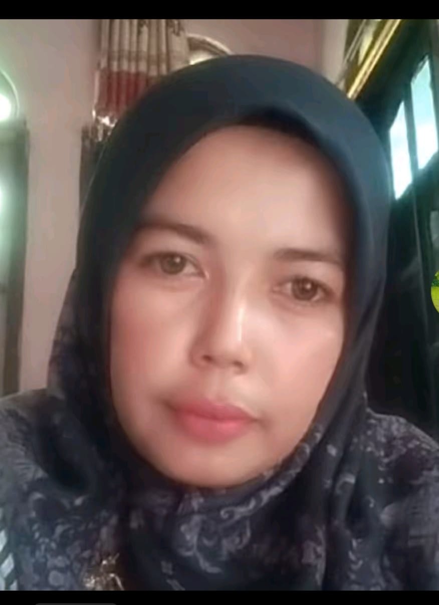 <center>-<br>Yusmarlina, S.Pd</center>
